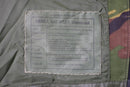 Close-up of label on genuine Dutch Army waterproof bi-laminated combat parka with DPM camouflage fabric detail.