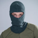 Man wearing a gray genuine Swiss Army knitted balaclava, designed for warmth and outdoor winter activities.