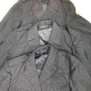 Genuine Swiss army wool jacket in grey, military issue uniform with epaulets and chest pockets, vintage Swiss design.