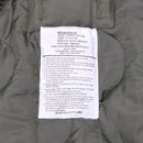 Label inside MFH Brand U.S. Army M65 Field Jacket showing size, care instructions, and fabric details