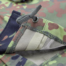 Close-up of Mil-Tec German army field jacket GoreTex Flecktarn camo showing stitching and waterproof fabric layers