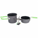 Compact OPTIMUS CRUX Lite solo camping stove with pot and pan featuring green foldable handles for hiking and outdoor use