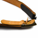 Close-up of original German military belt leather strap and metal box frame buckle detail on white background