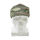 Original Greek army field cap in lizard camo pattern displayed on a white mannequin head for military surplus gear.