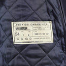 Close-up of vintage Italian Military Police coat label showing size, fabric, and care instructions on quilted lining