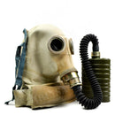 Original Polish Military SR 1 Soviet-era gas mask with hose and filter, authentic Cold War protective gear set.