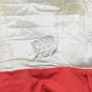 Close-up of inner label and stitching on vintage British red military jacket tunic lining