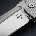 Couteau de poche pliant Boker Plus BabyX lame D2 manche acier inoxydable gris