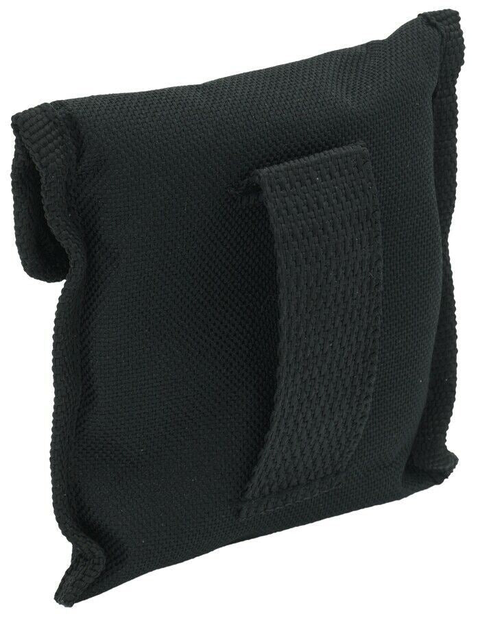 Black durable pouch with Velcro closure and loop for storing and carrying a foldable camping stove compactly.