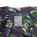 Inside view of genuine British Army DPM camouflage jungle military parka with size and care label visible
