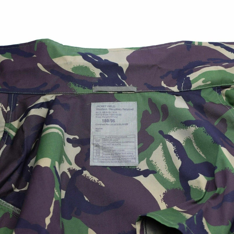Inside view of genuine British Army DPM camouflage jungle military parka with size and care label visible