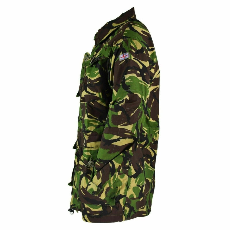 Side view of genuine British Army DPM camouflage combat jungle military parka jacket with multiple pockets and adjustable cuffs