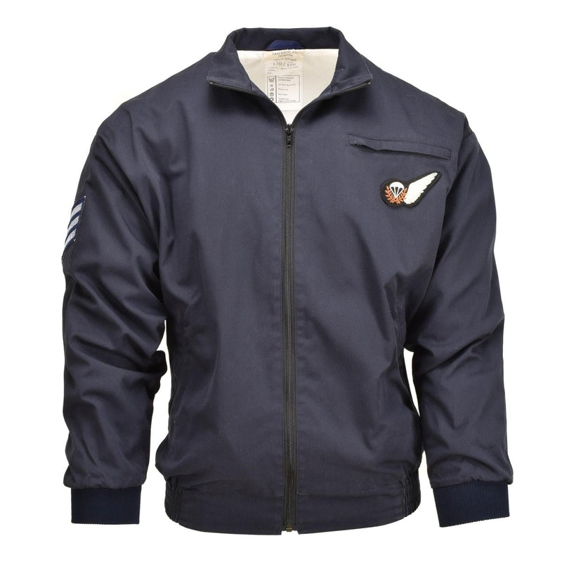 Genuine British RAF blue bomber jacket with full zipper, elastic cuffs, and military insignia patch on chest and sleeve.