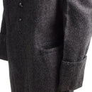 Close-up of genuine Bulgarian military wool trench coat with buttoned front and side pocket detail in dark gray
