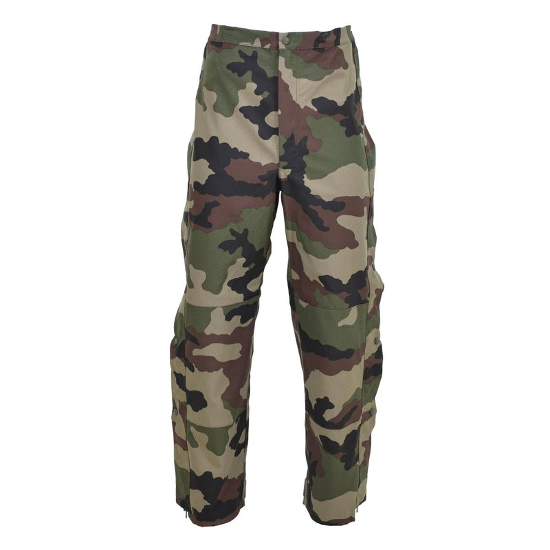 Genuine French Army trilaminate waterproof rain pants with CCE camo pattern and adjustable braces for secure fit.