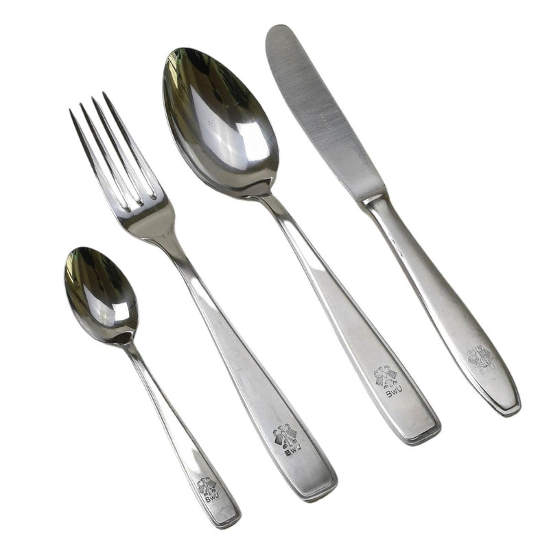 German military stainless steel cutlery set with fork, large spoon, knife, and teaspoon on white background