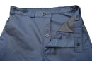 Close-up of genuine Swiss Civil Defense blue combat trousers with button fly and reinforced waistband details