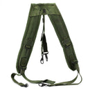 Genuine US Army LC-2 military belt suspenders in olive green with padded straps and ALICE attachment clips for heavy load support.