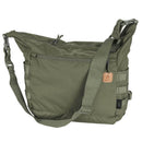 Olive green Helikon-Tex Bushcraft Satchel with adjustable shoulder strap and MOLLE panels for outdoor and tactical use