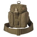 Helikon-Tex Essential Kit Bag in olive cordura with MOLLE loops, adjustable strap, and multiple zippered compartments.