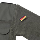 Gray fabric with a German flag patch on a white background