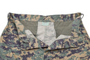 Close-up of Mil-Tec U.S. Army-style digital woodland camo pants showing waistband and zipper area.