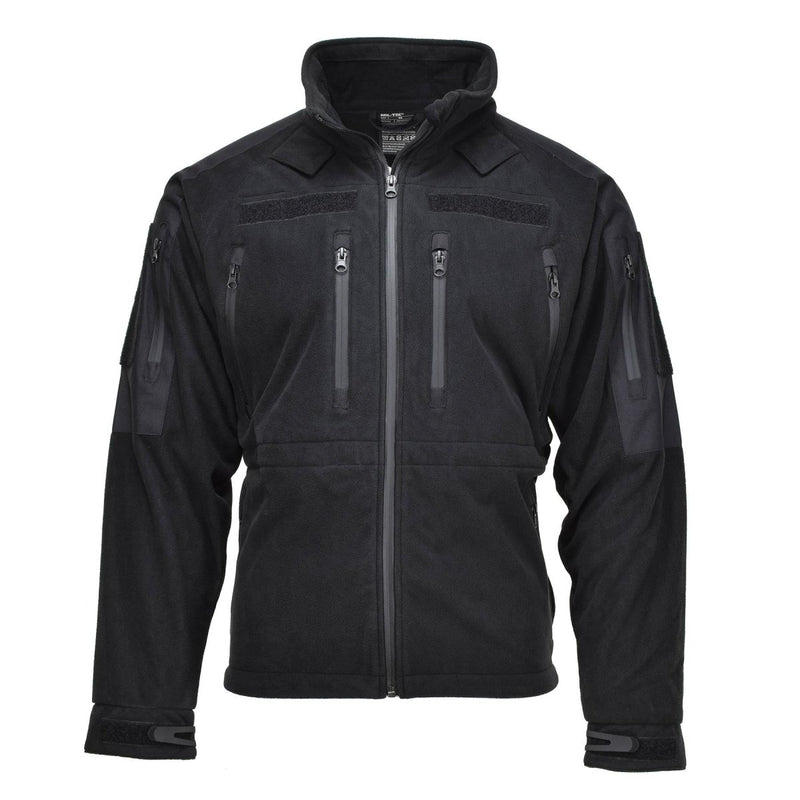 Black MIL-TEC cold weather fleece jacket with full zip, multiple pockets, and water-resistant thermal fabric.
