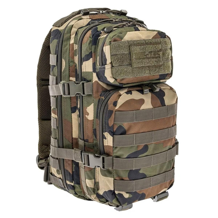 MIL-TEC U.S. Assault tactical backpack 20 liters in woodland camouflage with MOLLE system, padded straps for hiking, trekking