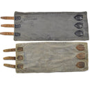 Pair of vintage Original Austrian Army M58 leg gaiters with leather straps, military surplus gear for outdoor protection.