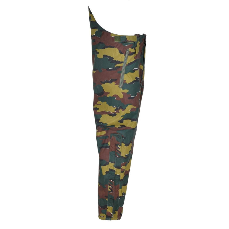 Side view of original Belgian military waterproof pants in jigsaw camouflage with suspenders and multiple pockets