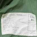 Label on sage green Original British Army Aircrew MK16A coverall showing product details and specifications