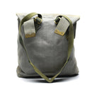 Original British Army M37 haversack in grey canvas with adjustable straps and buckle closures, vintage military side bag.