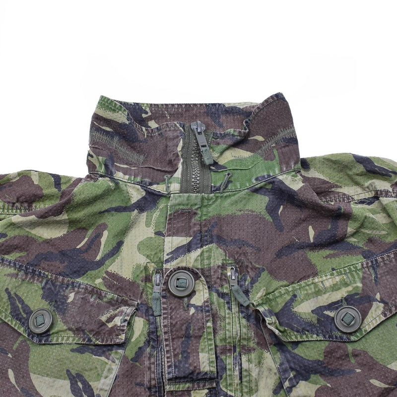 Close-up of original British army DPM jungle jacket parka with rip-stop fabric and buttoned chest pockets