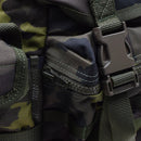 Close-up of original Czech Republic military molle backpack quick release buckle and zipper in woodland camo pattern
