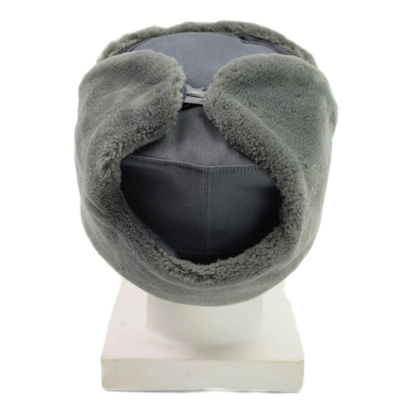 Original East Germany army officer winter ushanka hat with faux fur trim and ear flaps for cold weather warmth and protection