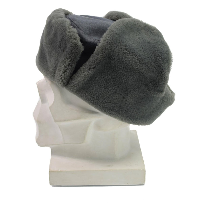 Original East German army officer winter ushanka hat with gray faux fur trapper style ear flaps for cold weather warmth.