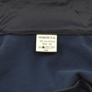 Close-up of clothing label on navy blue polyester fabric from French Army training tracksuit pants size 162, year 2008.