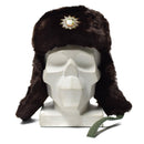 Original German police ushanka winter hat with faux fur lining, ear flaps, and cocarde badge for cold weather warmth.