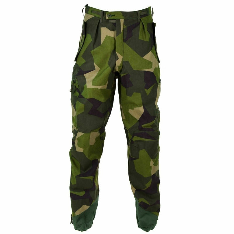 Original Swedish Army M90 splinter camouflage combat pants with reinforced knees, ankle zips, and secure pocket closures.