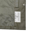 Close-up of olive green Original Swiss army rain jacket label showing size 44/48 and material details.