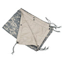 Original U.S. Army reversible tarp ground cover blanket with camo and tan sides for tactical outdoor use.
