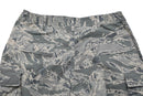 Original U.S. military field pants in digital tiger stripe camo with durable ripstop fabric and multiple cargo pockets.