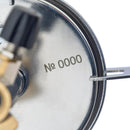 Close-up of the Primus ClassicTrail Stove 130 camping burner showing the metal base with serial number 0000.