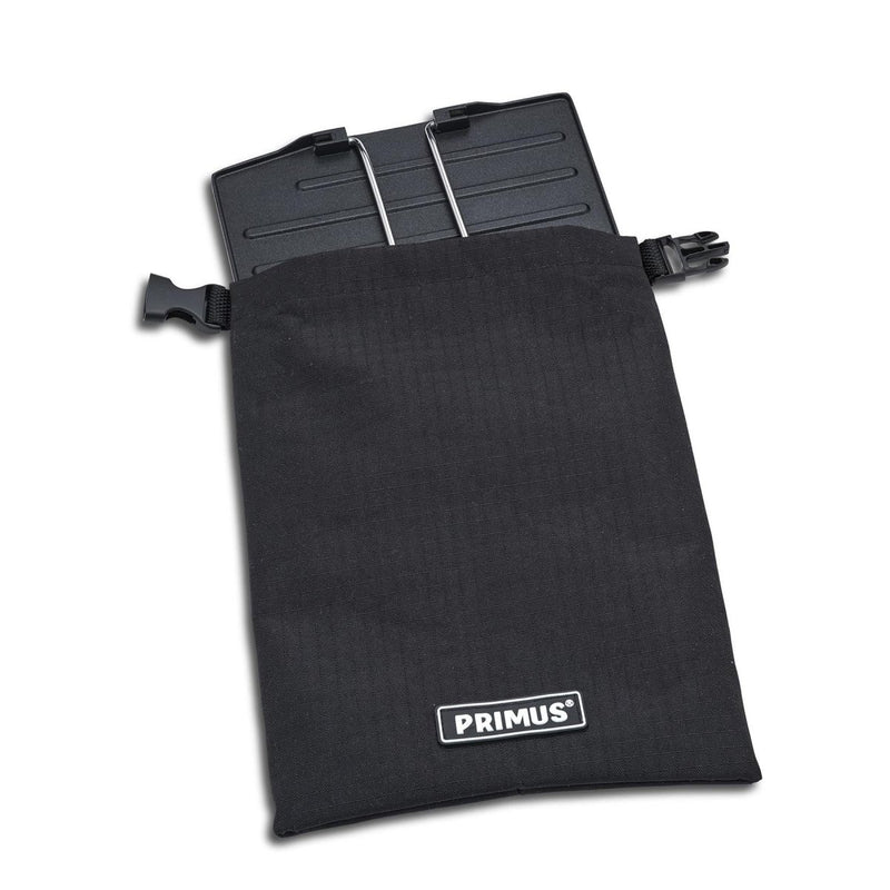 Primus Tupike outdoor stove griddle plate partially visible inside black carrying pouch with Primus logo