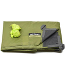 Folded olive green Tatonka waterproof tarp shelter with reinforced corners and attached guy line rope.