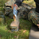 Pouring steaming Trek'N Eat Spicy Beef Casserole freeze-dried meal into camping cookware outdoors